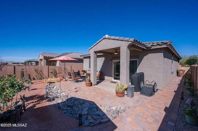 rear view of property with a patio area