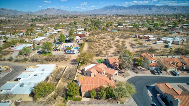 birds eye view of property with a residential view and a mountain view