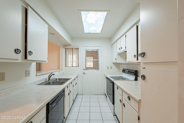 kitchen featuring sink, dishwasher, range with electric cooktop, white cabinets, and light tile patterned flooring