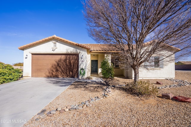 ranch-style home with a garage