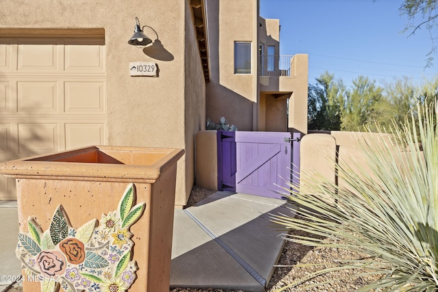 view of property exterior featuring a garage