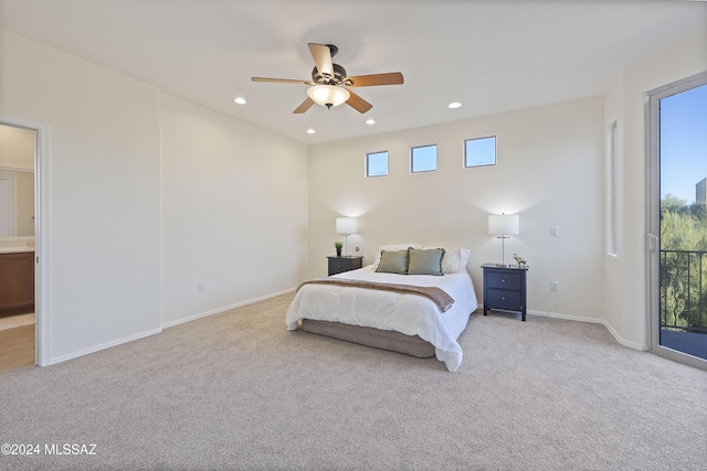 carpeted bedroom featuring multiple windows, access to outside, and ceiling fan