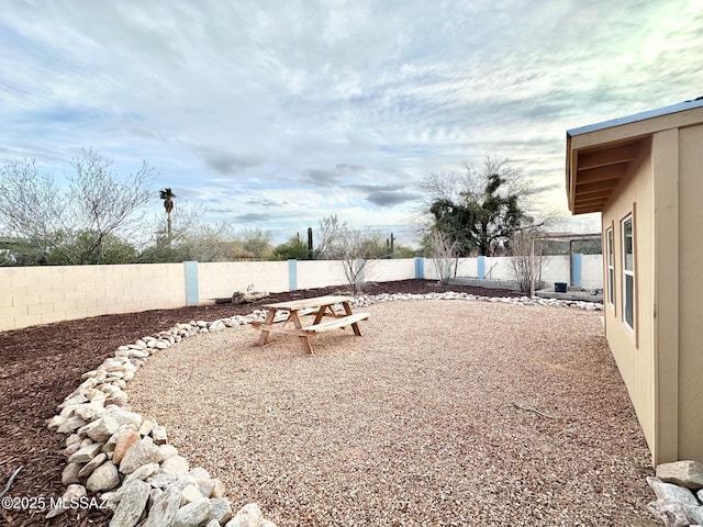 view of yard with a fenced backyard