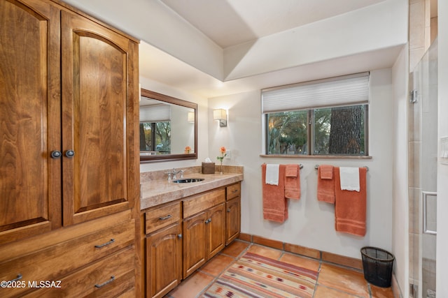 bathroom with vanity and tile patterned flooring