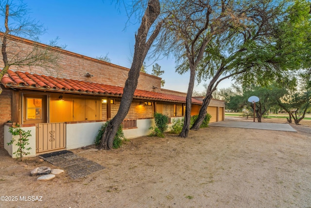 exterior space with a garage