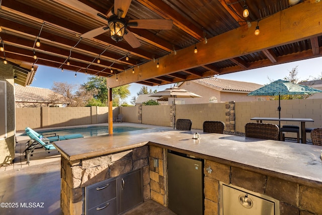 view of patio / terrace featuring ceiling fan and area for grilling