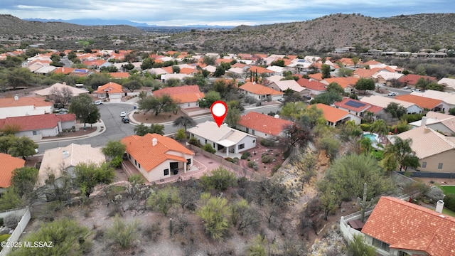 bird's eye view with a mountain view and a residential view