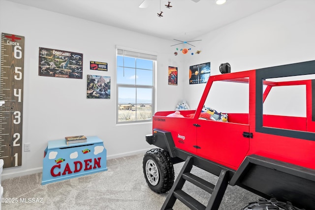 game room featuring baseboards and carpet flooring