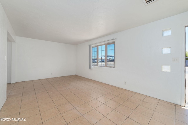 view of tiled spare room