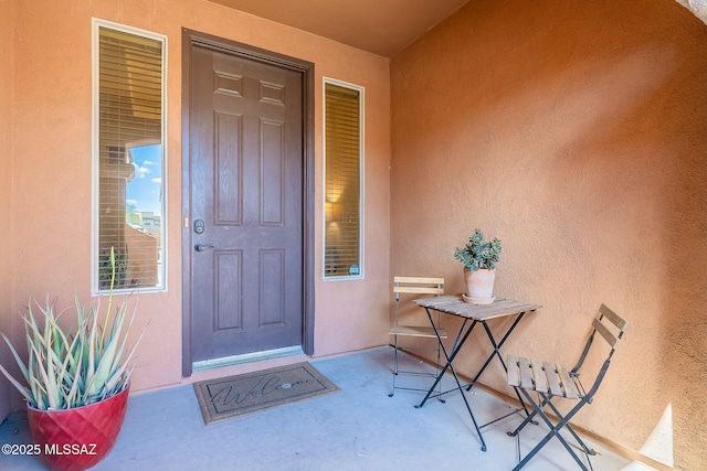 6266 W Scotch Pine Ln, Tucson, AZ 85743 - doorway to property featuring stucco siding