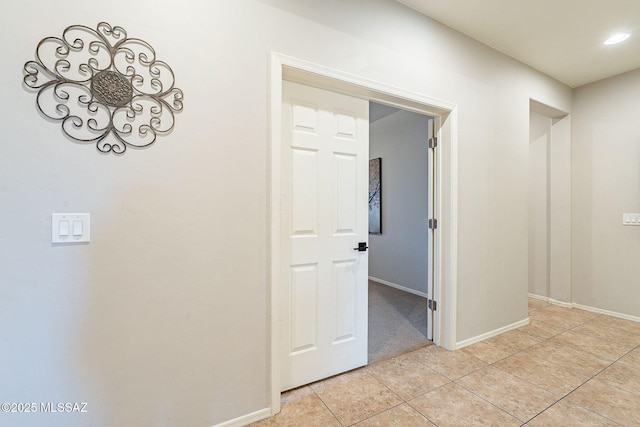 6266 W Scotch Pine Ln, Tucson, AZ 85743 - hallway featuring light tile patterned floors, baseboards, light carpet, and recessed lighting