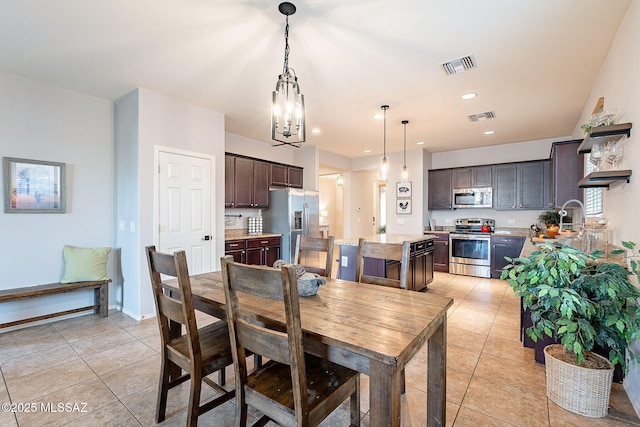 dining area with light tile patterned floors, recessed lighting, and visible vents