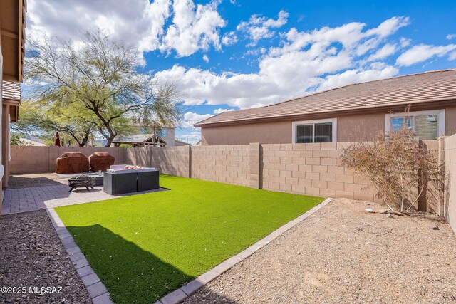 6266 W Scotch Pine Ln, Tucson, AZ 85743 - view of yard with a patio area