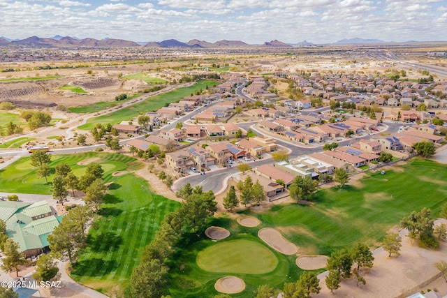 birds eye view of property featuring golf course view, a residential view, and a mountain view