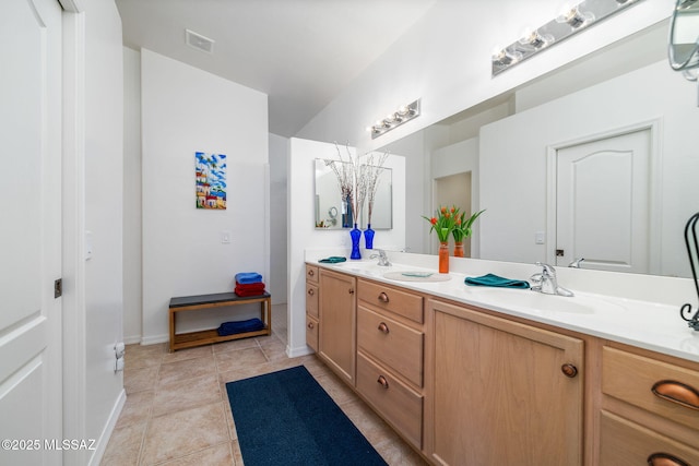 bathroom with vanity and tile patterned floors