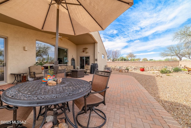 view of patio with ceiling fan