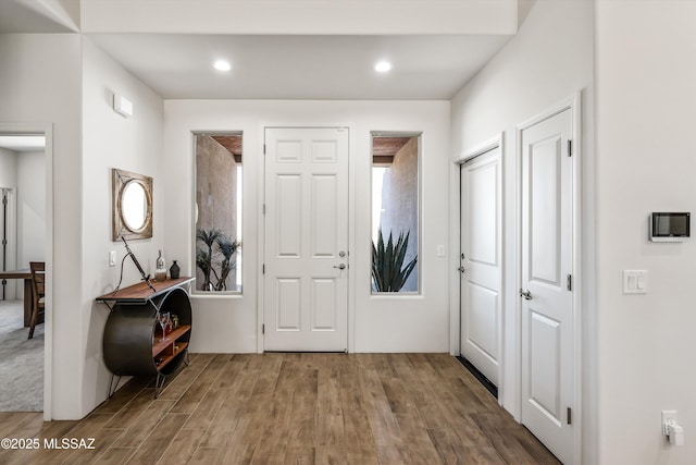 foyer featuring recessed lighting and wood finished floors