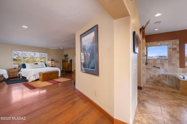 bedroom featuring hardwood / wood-style floors