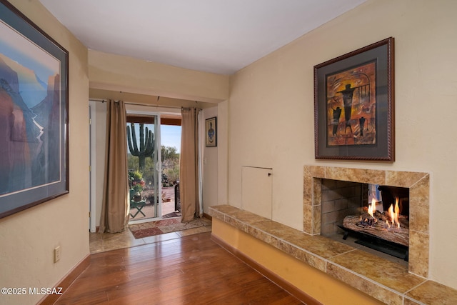 hallway with dark hardwood / wood-style floors