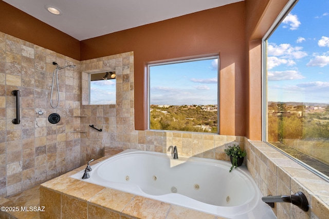 bathroom with shower with separate bathtub