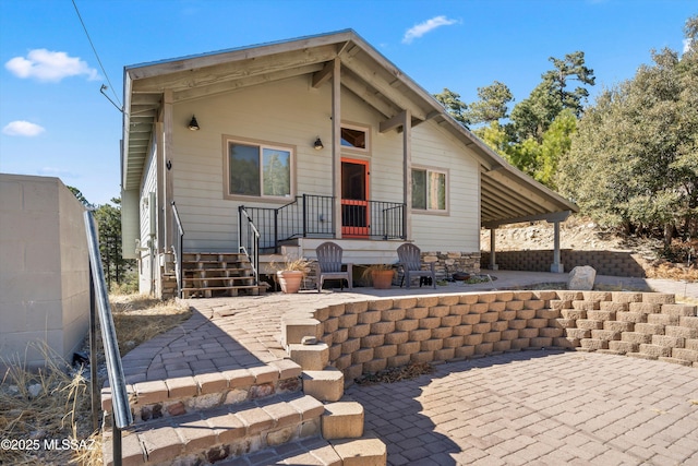 rear view of house with a patio area