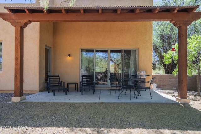 view of patio featuring a pergola