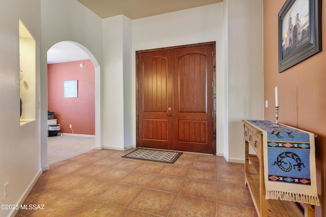 entryway with tile patterned flooring