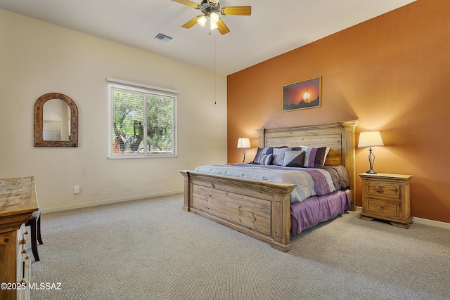 bedroom featuring ceiling fan and light colored carpet