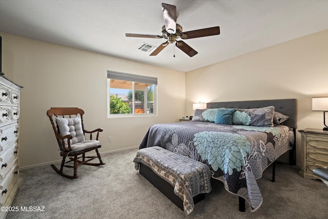 bedroom with baseboards, carpet, visible vents, and a ceiling fan