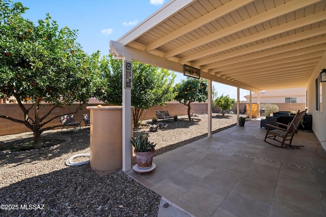 view of patio featuring a fenced backyard