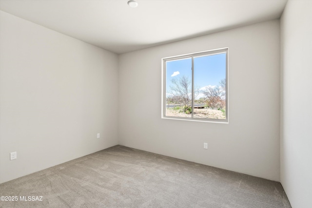 empty room featuring carpet flooring