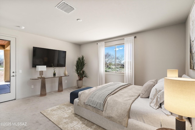 bedroom featuring visible vents and carpet floors