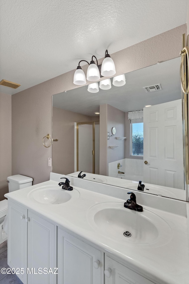 5481 W Cochie Springs St, Marana, AZ 85658 - full bathroom featuring a shower stall, visible vents, and a sink