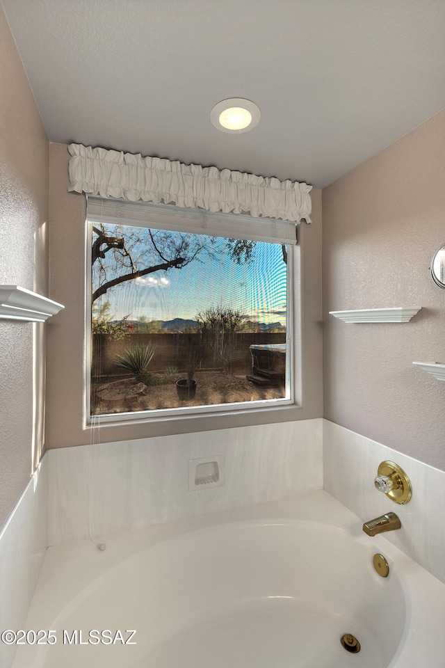 5481 W Cochie Springs St, Marana, AZ 85658 - full bath with a bath and a textured wall