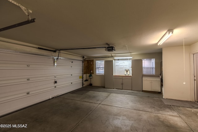 5481 W Cochie Springs St, Marana, AZ 85658 - garage featuring a garage door opener