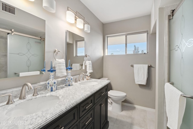 full bath with toilet, a sink, visible vents, and a shower stall