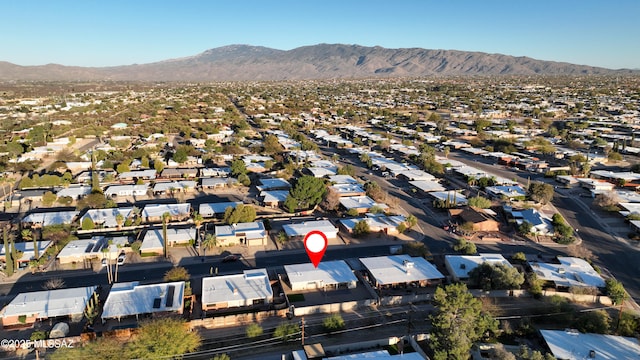 birds eye view of property featuring a residential view and a mountain view