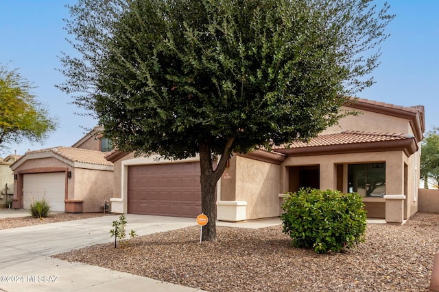 view of front of property with a garage