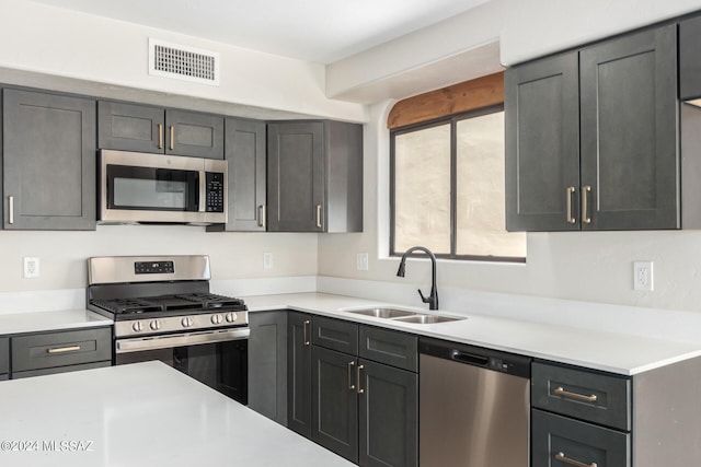 kitchen with appliances with stainless steel finishes and sink