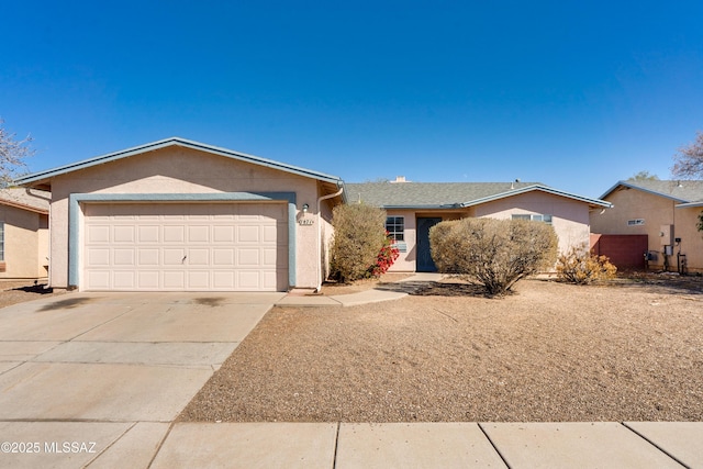 single story home with a garage