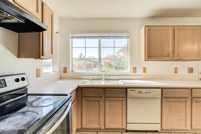 kitchen with sink, stainless steel range with electric stovetop, a textured ceiling, light brown cabinets, and dishwasher