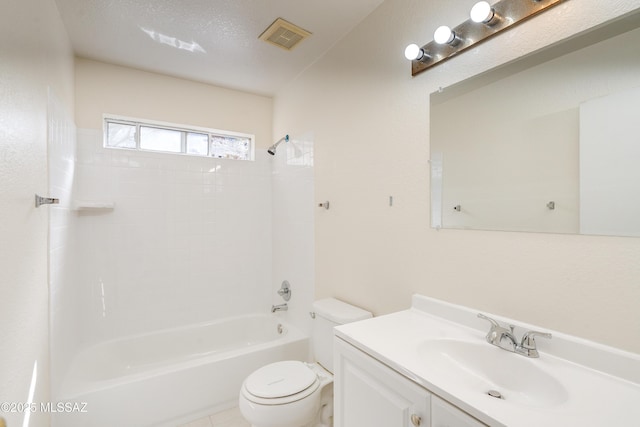 full bathroom with vanity, toilet, bathing tub / shower combination, and a textured ceiling