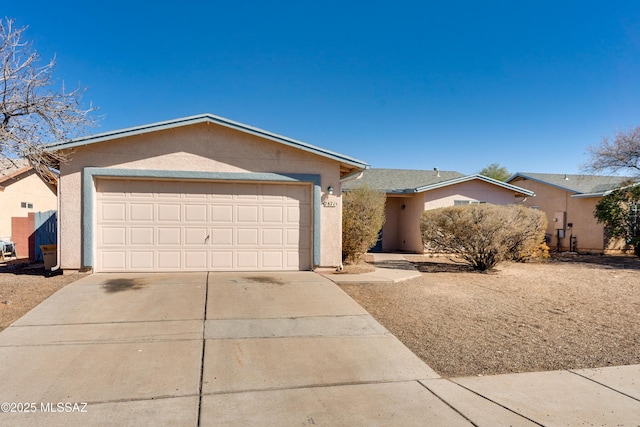 ranch-style home featuring a garage