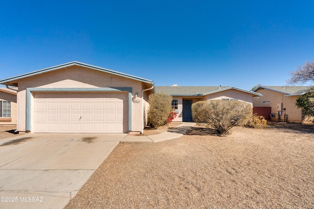 ranch-style home featuring a garage