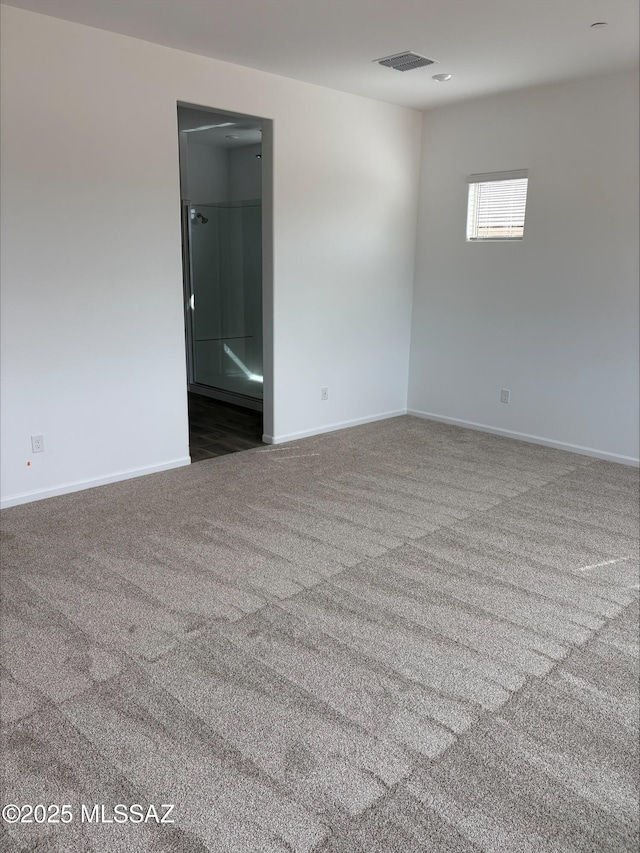 6650 W Winding Knoll Pl, Marana, AZ 85658 - unfurnished room with baseboards, visible vents, and carpet flooring