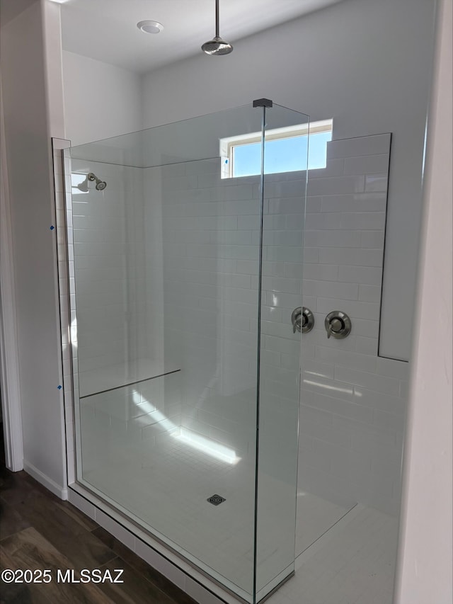 6650 W Winding Knoll Pl, Marana, AZ 85658 - bathroom with a stall shower and wood finished floors