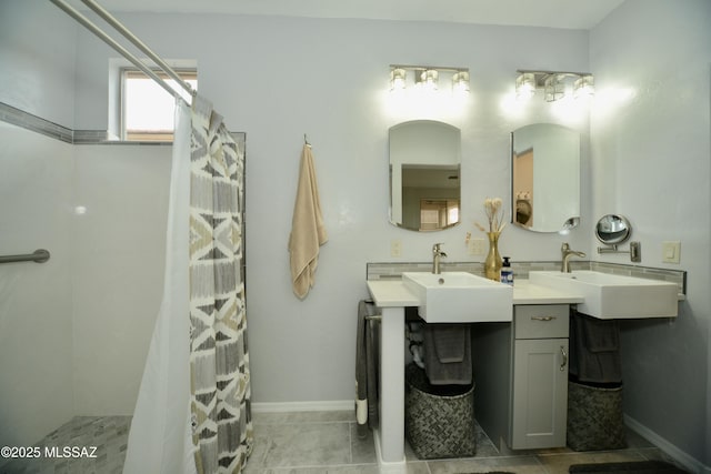 bathroom featuring vanity and tile patterned flooring