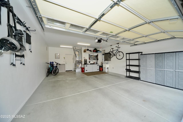 garage featuring a garage door opener