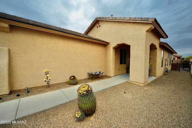 rear view of property with a patio area