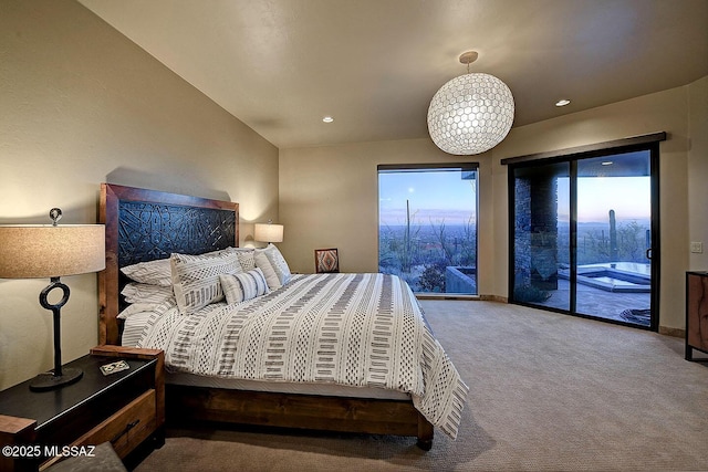 carpeted bedroom featuring access to exterior